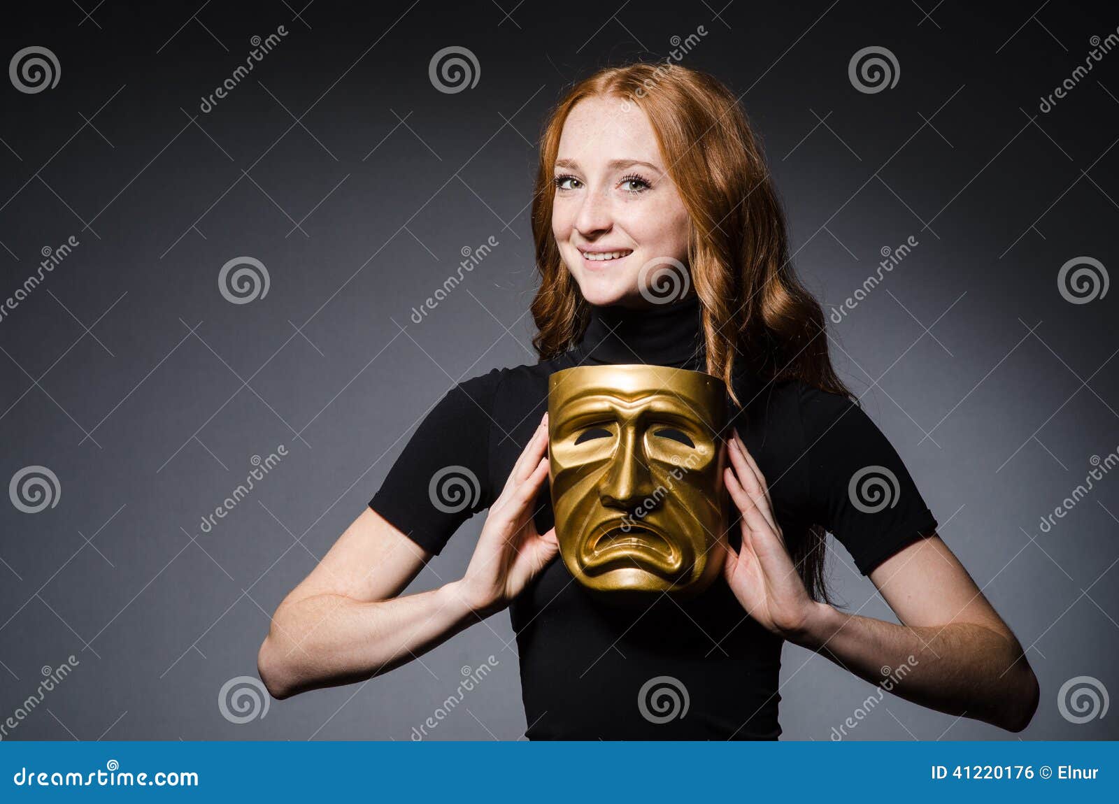 redhead woman iwith mask in hypocrisy consept against