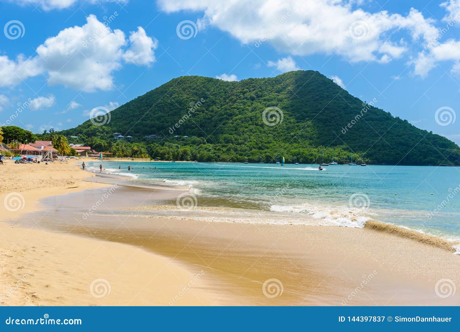 reduit beach - tropical coast on the caribbean island of st. lucia. it is a paradise destination with a white sand beach and