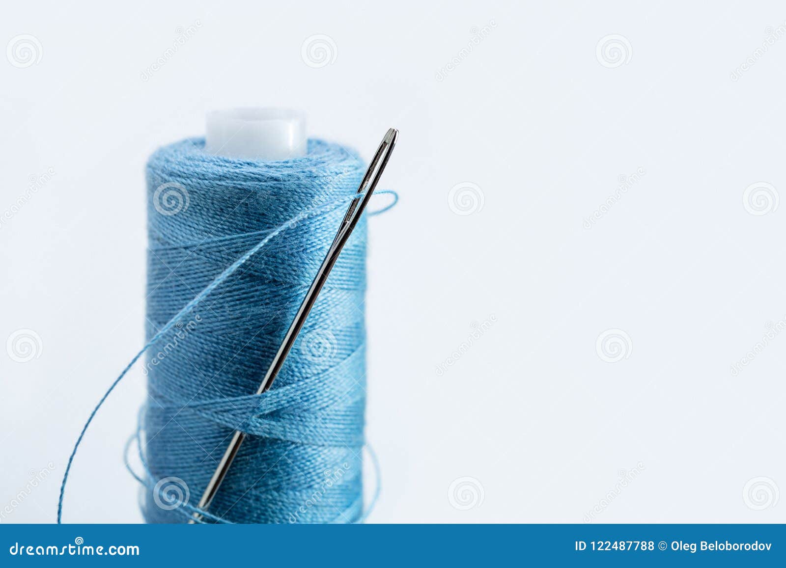 In Coil of Blue Thread Large Needle for Sewing. Stock Photo Image of handicraft, clothing