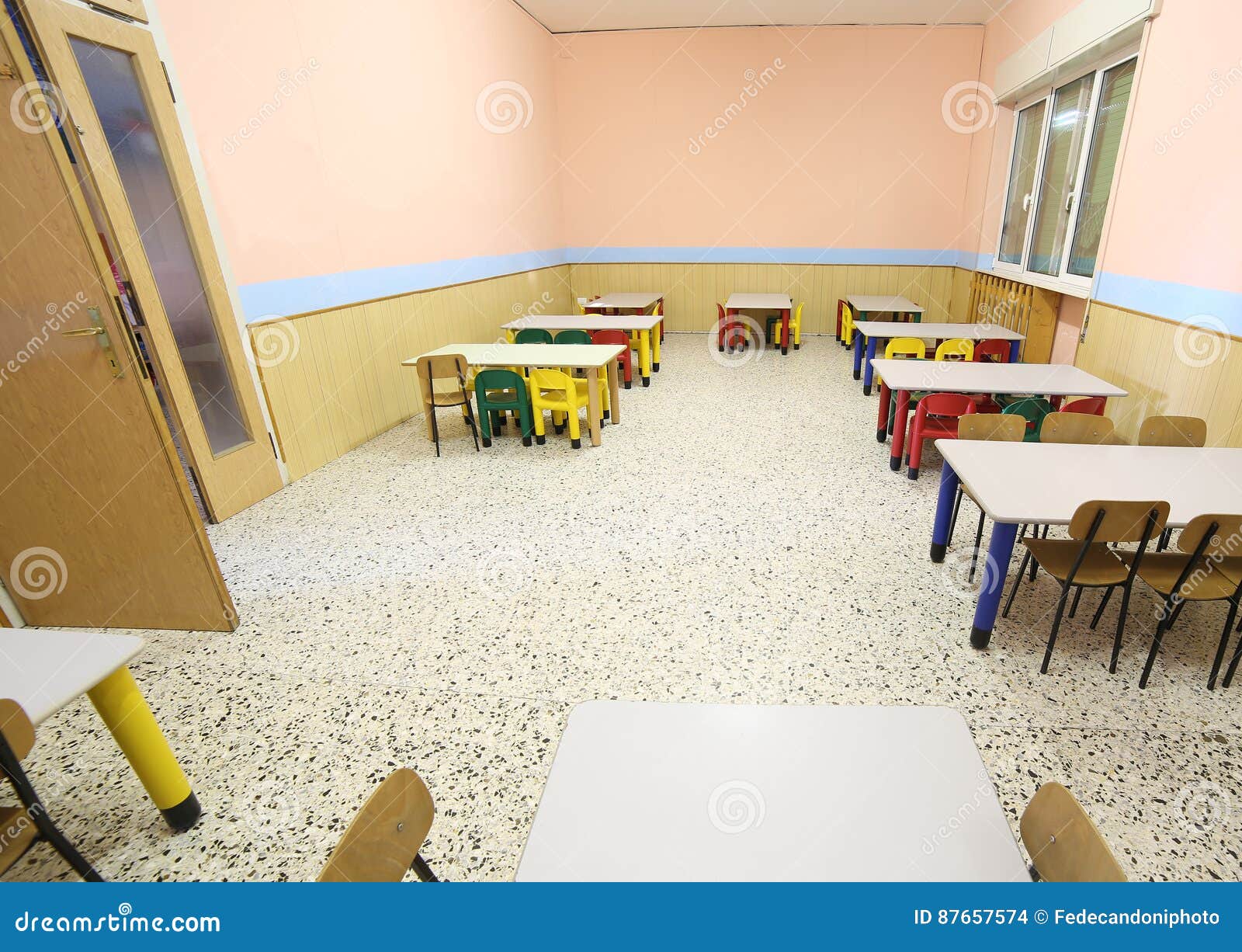 refectory of a school for children with small chairs and tables