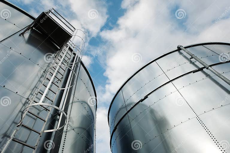 Refinery ladder and tanks stock image. Image of pipe, construction ...