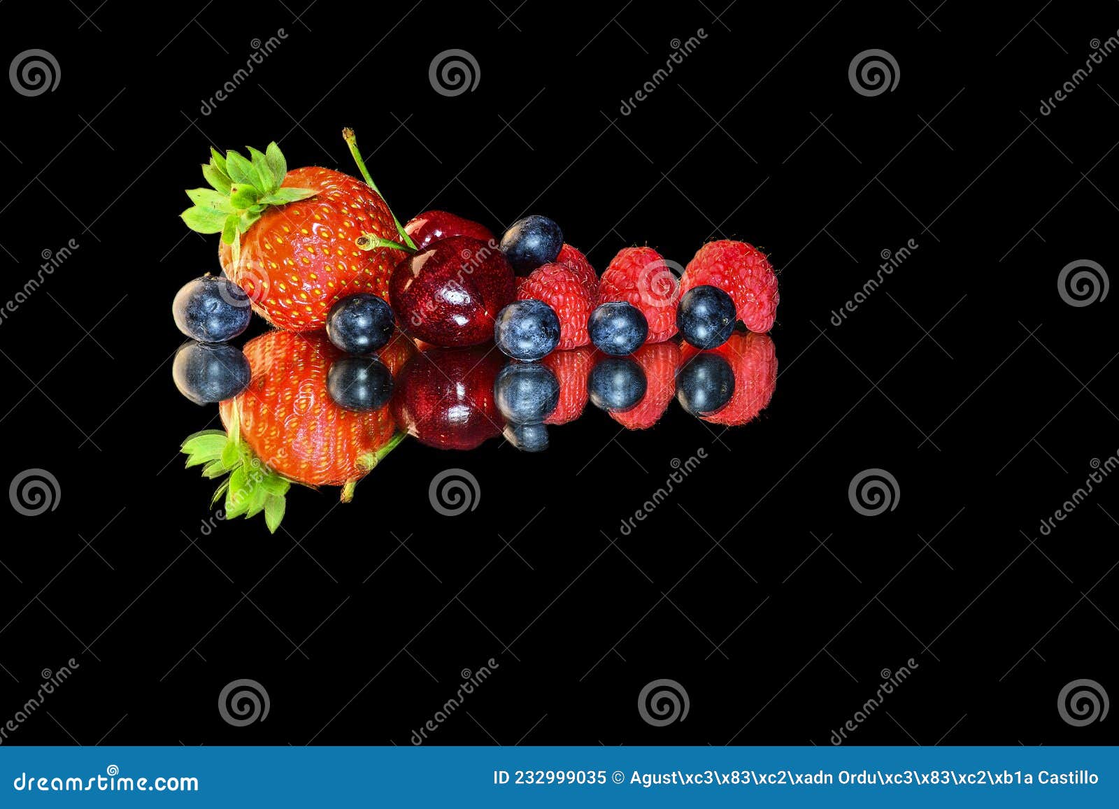 reflection of fruits, in a mirror on a black background