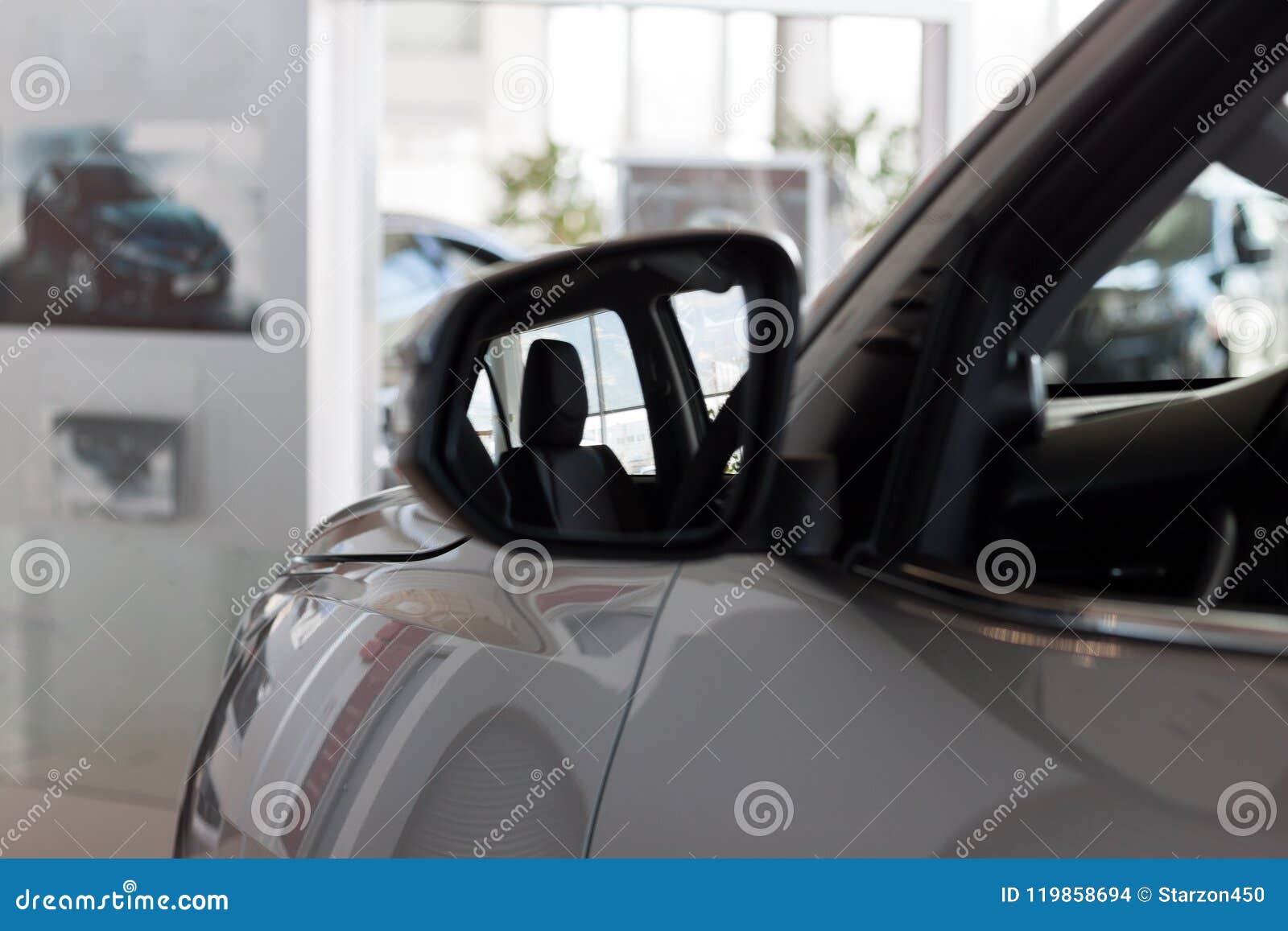 Reflection in Side Mirror of the Interior of the New Car. Stock Photo