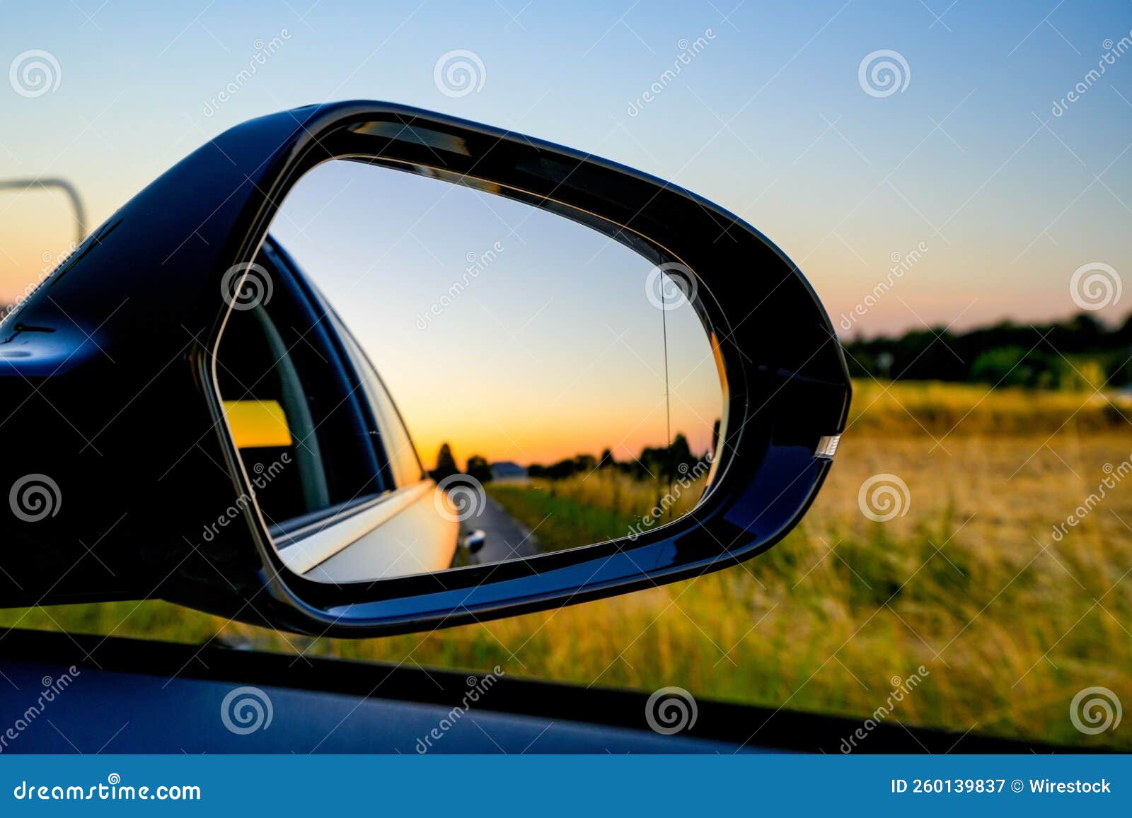 Reflection in the Sideview Mirror of a Car Stock Image Image of