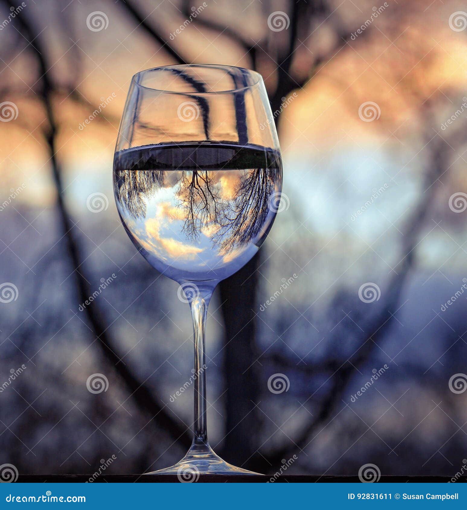 Reflection in a wine glass stock image. Image of sunset 92831611