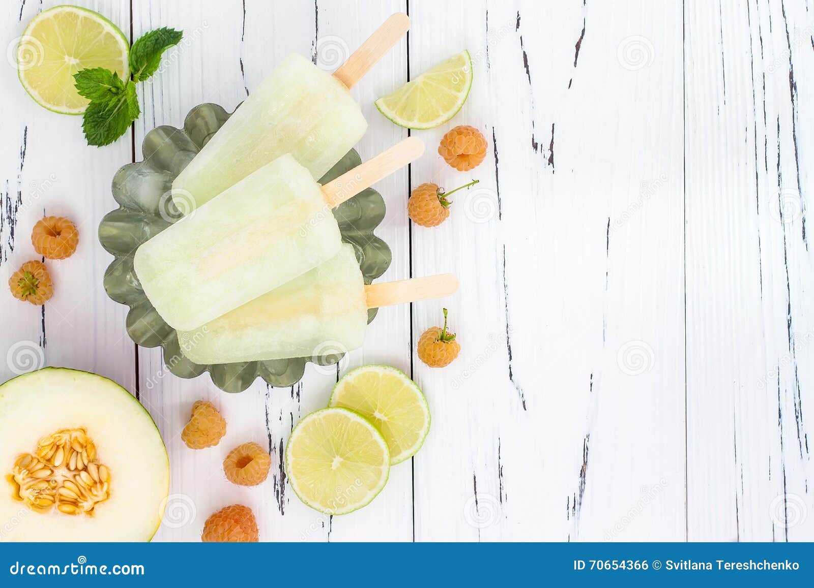 refreshing mexican style ice pops - raspberry, lime, honeydew margarita paletas - popsicles. top view. cinco de mayo recipe