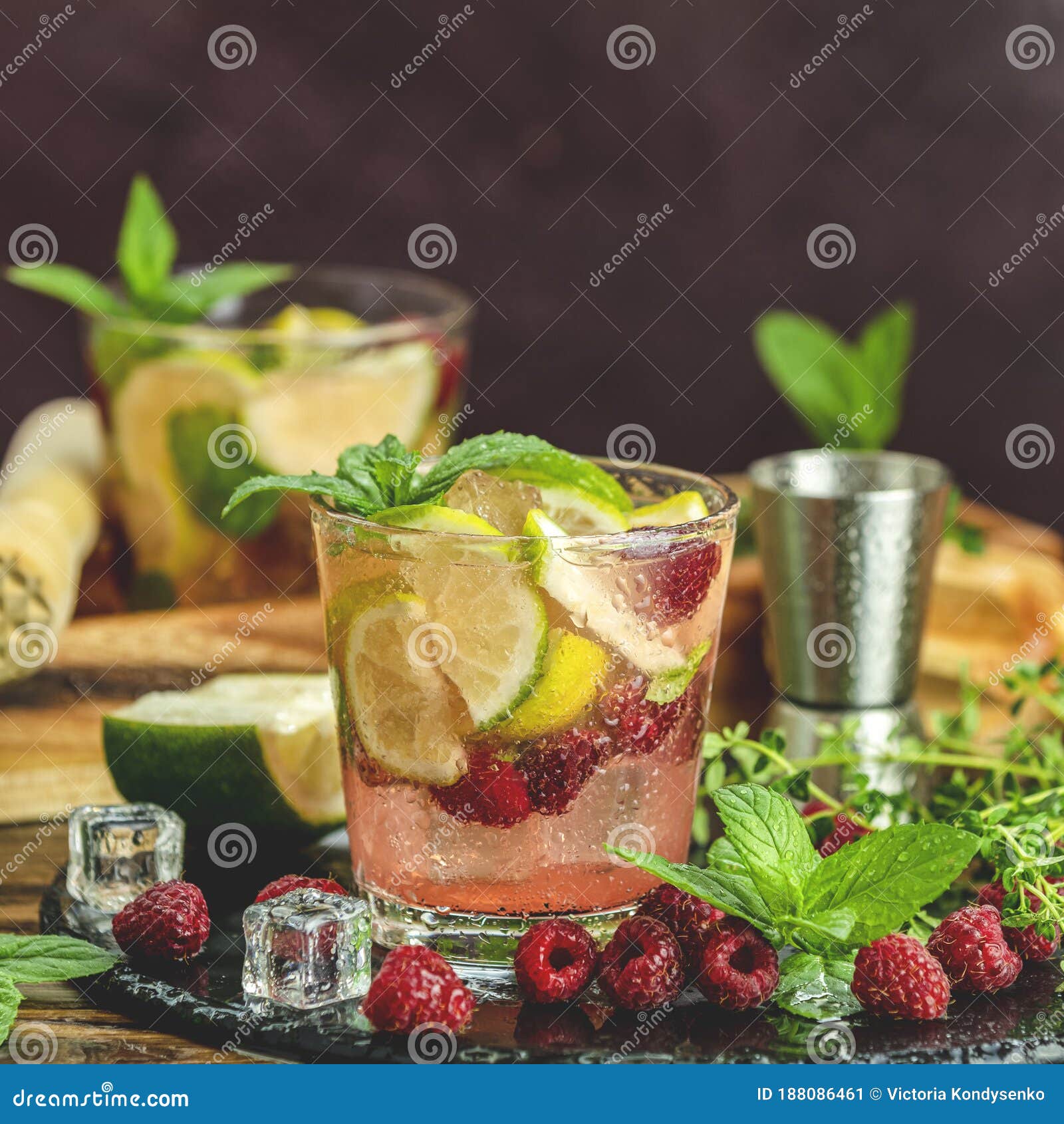 Refreshing Mint Cocktail Mojito with Rum, Lime, Mint, Thyme, Ice and