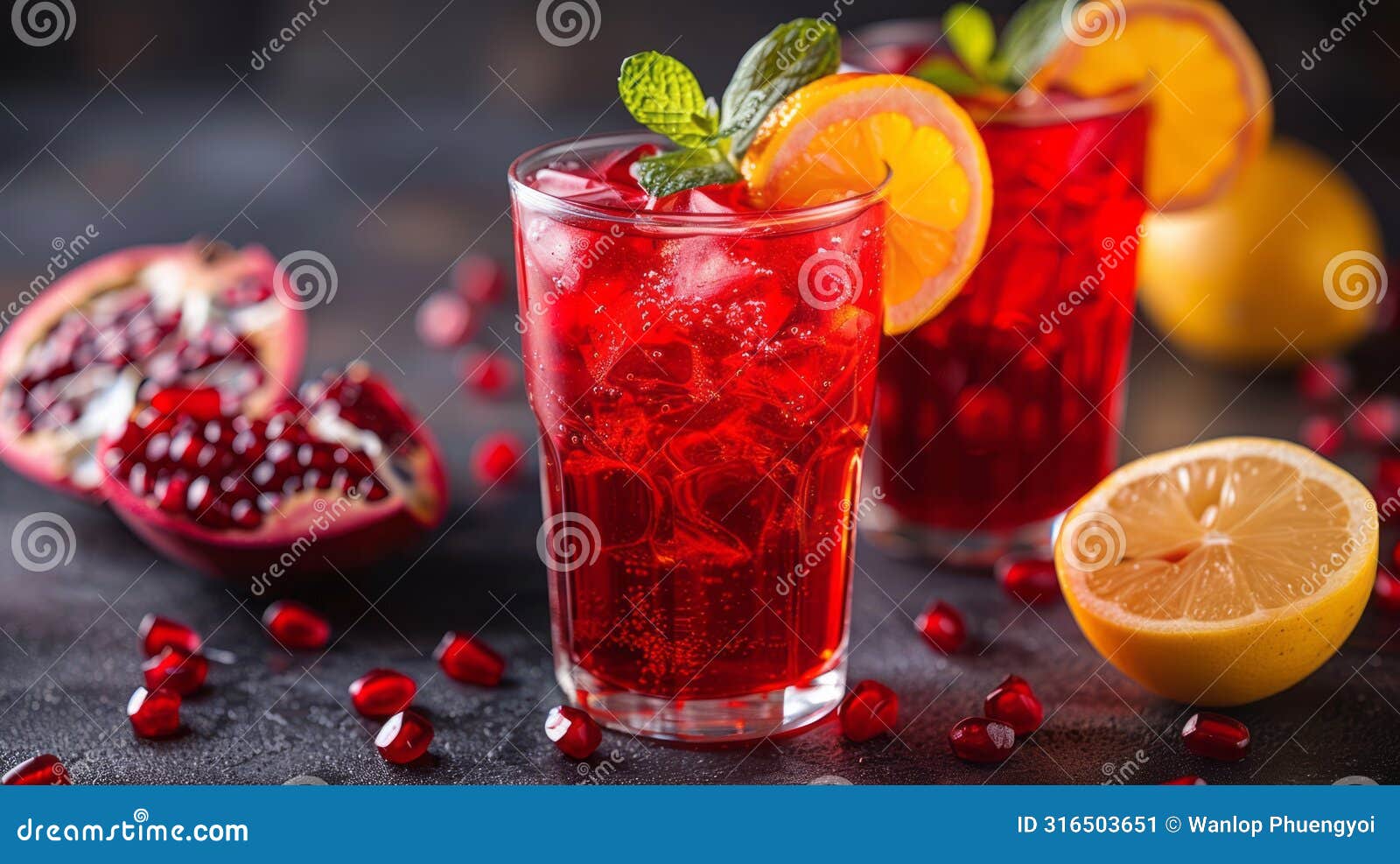 refreshing pomegranate cocktail with orange and mint