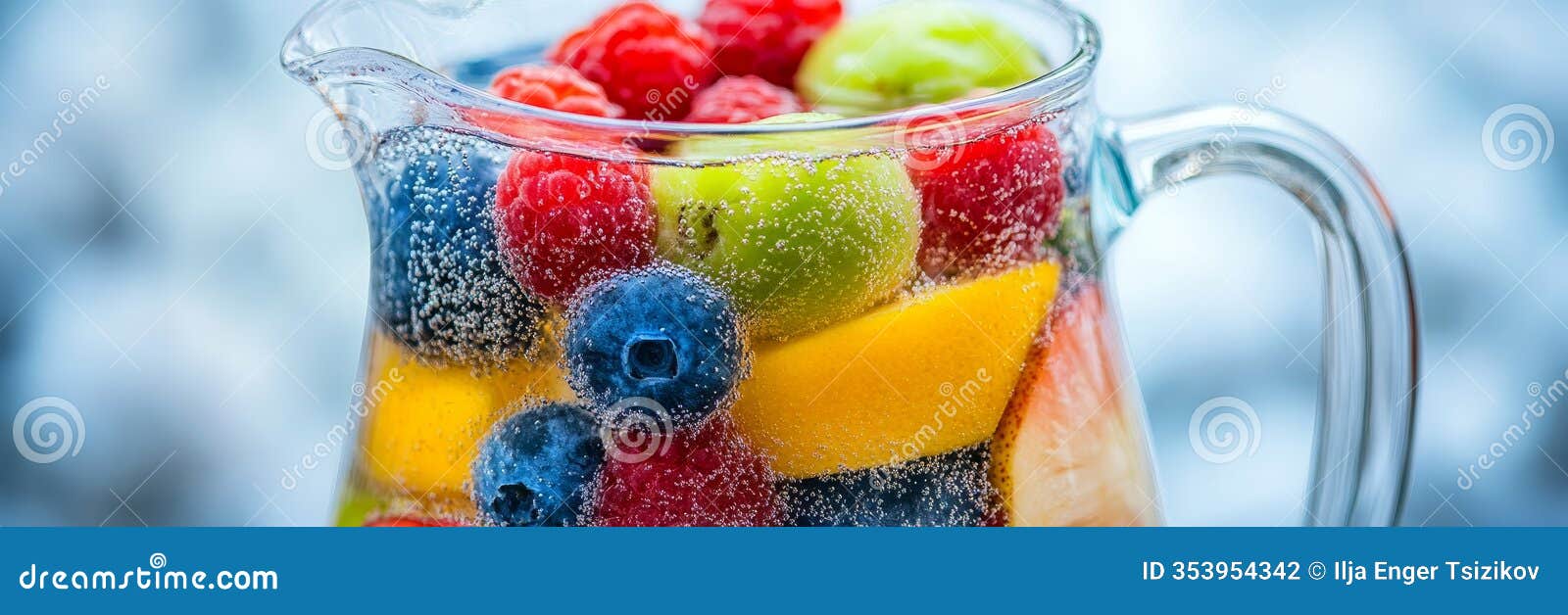 refreshing summer beverage fruit infused water in glass pitcher , perfect thirst quencher