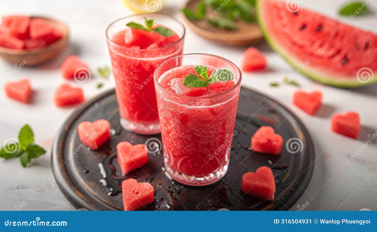 refreshing watermelon slush with mint in glasses on white background