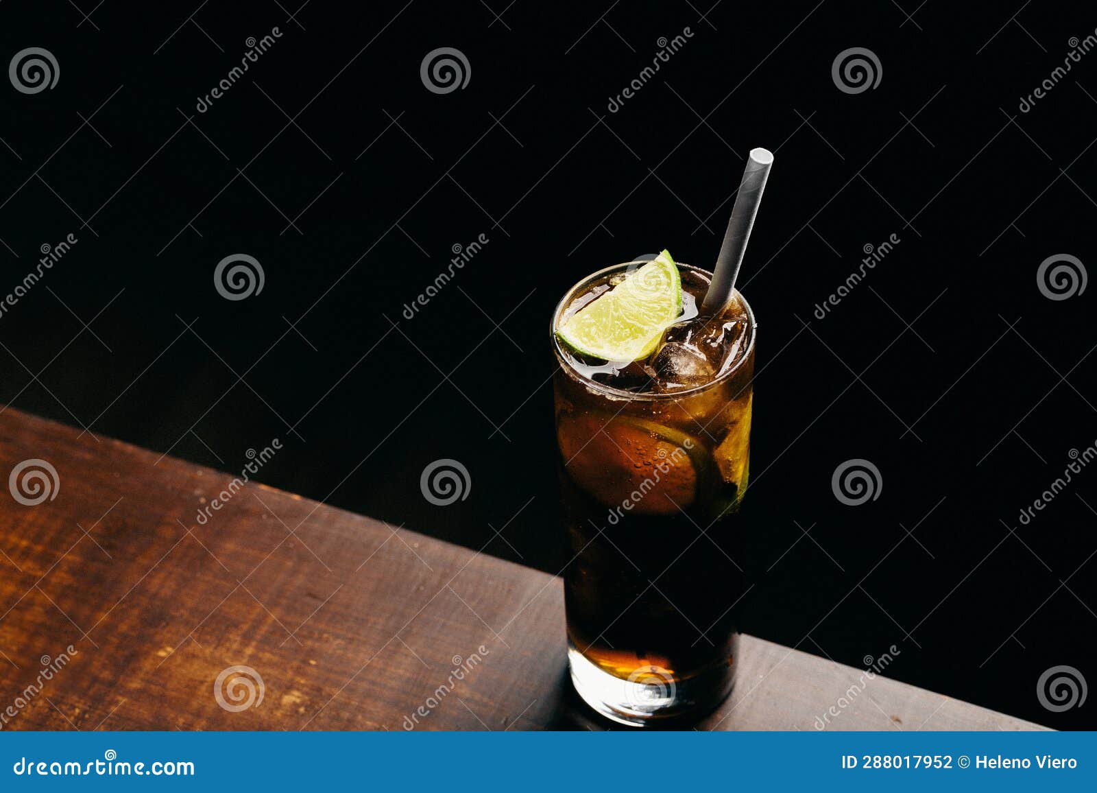 Refreshment Cuba Libre Cocktail, Rum, Fresh Lime, Aromatic Bitters and