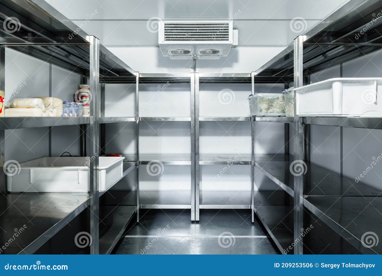refrigerator chamber with steel shelves in a restaurant