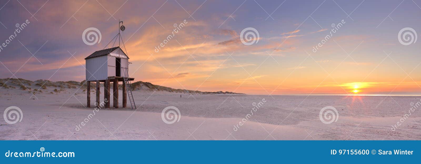 refuge hut on terschelling in the netherlands at sunset