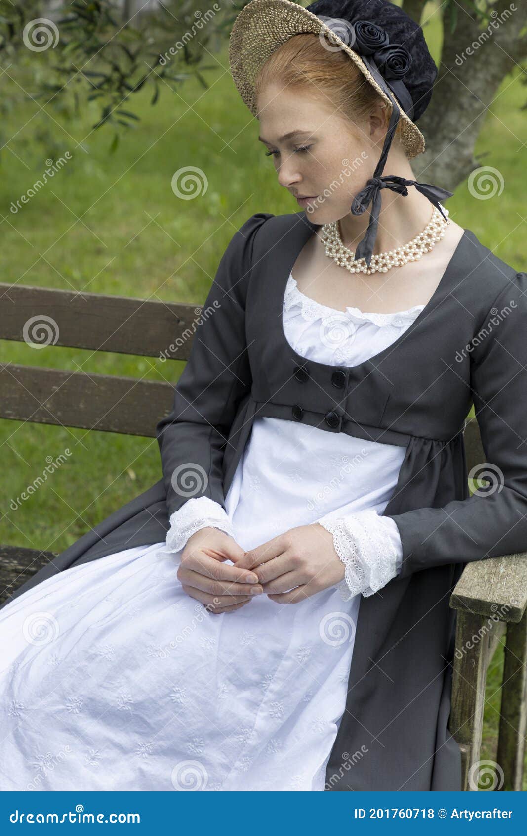 a regency woman wearing a white cotton muslin dress, a long spencer and a bonnet and standing in a room