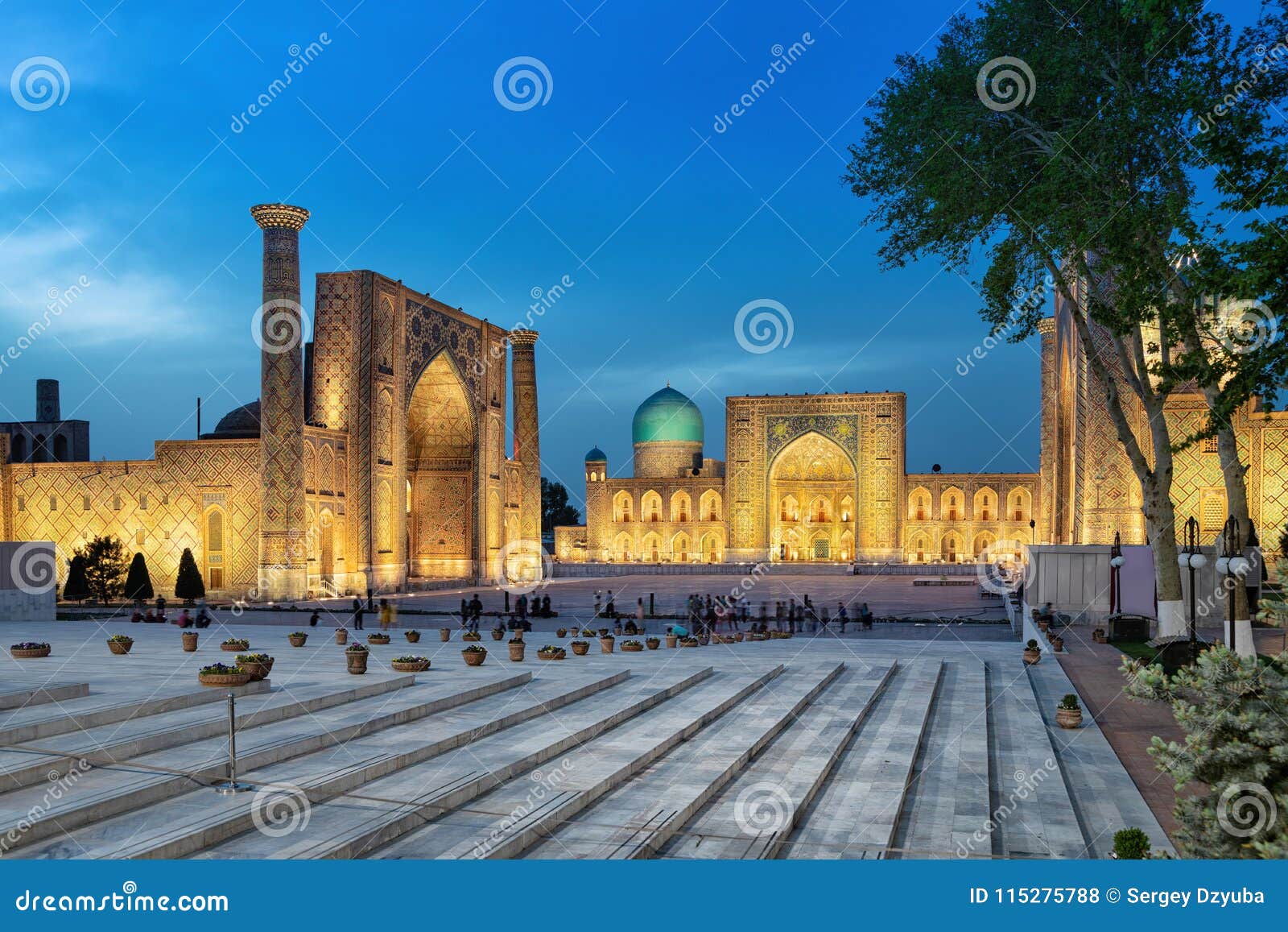 registan square at dusk in samarkand, uzbekistan