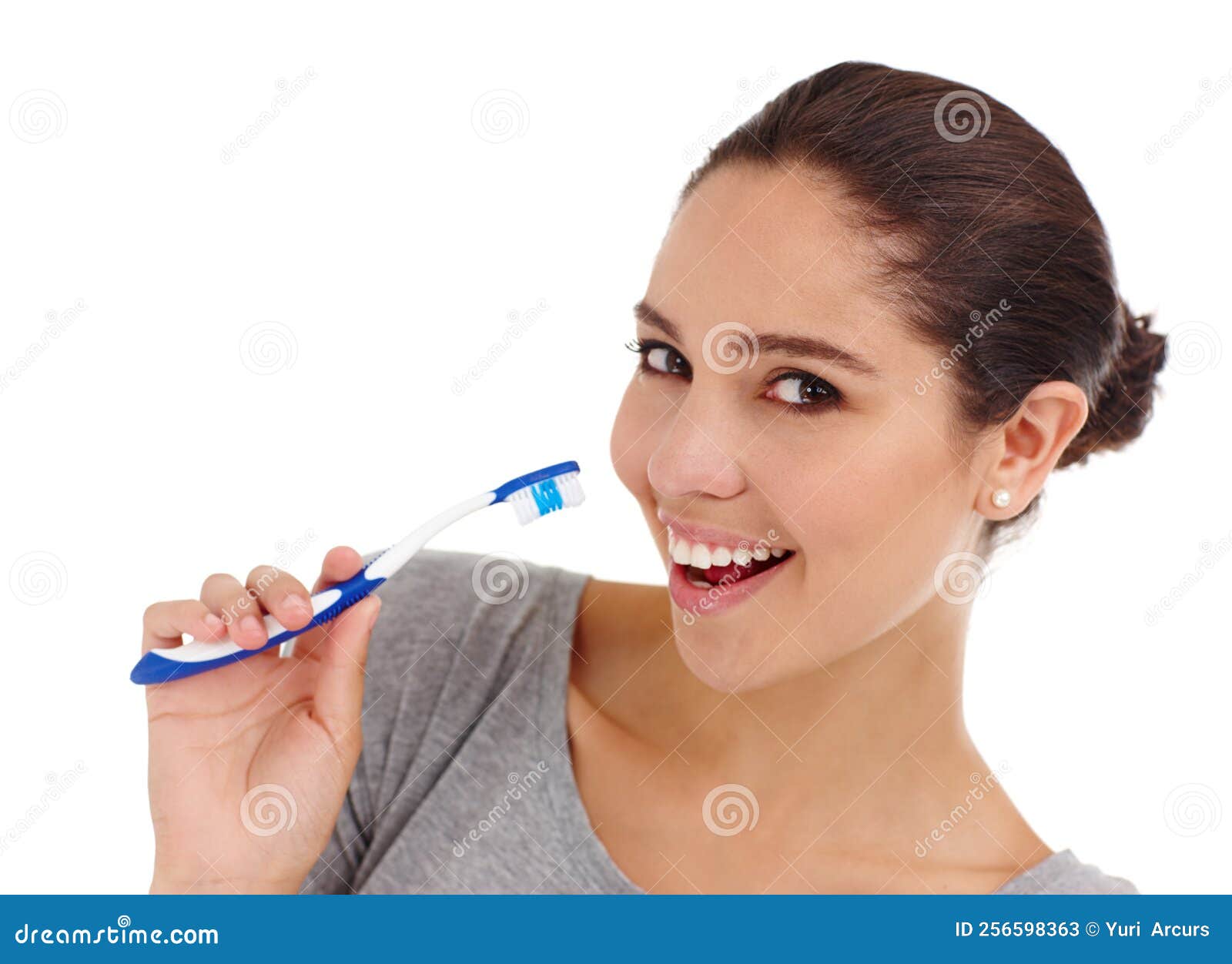 Regular Cleaning for Strong Teeth and Gums. a Young Woman Brushing Her