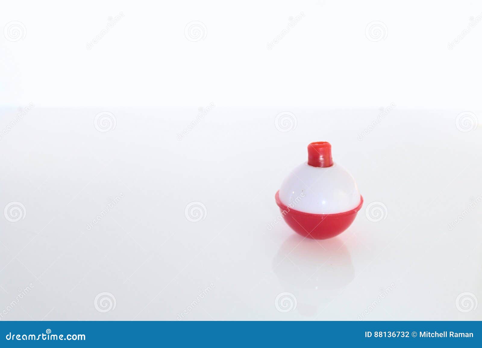 Regular Red And White Bobber For Fishing Isolated Stock