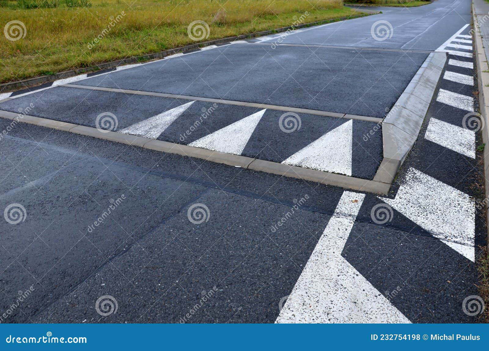 A Regular Square Raised Above the Level of the Asphalt Road Beveled on ...