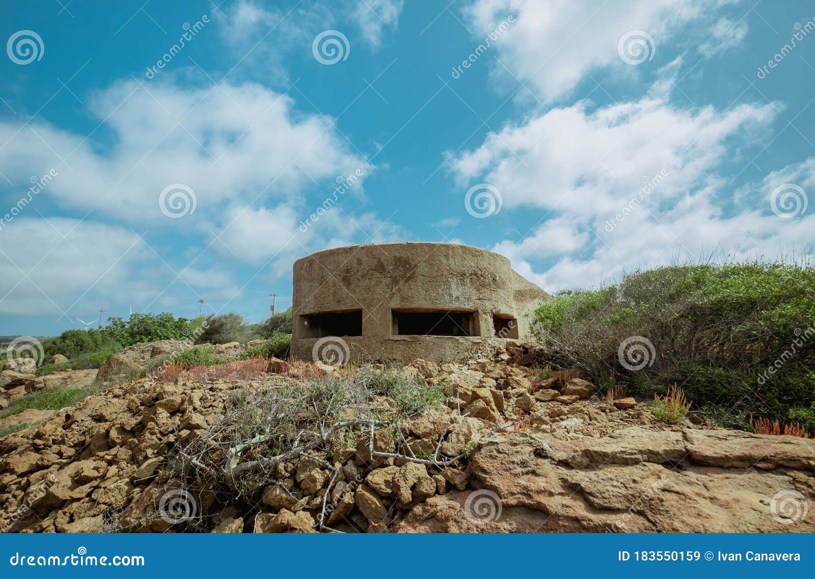 reinforced concrete bunker from the second world war and located on the south-western coast of sardinia