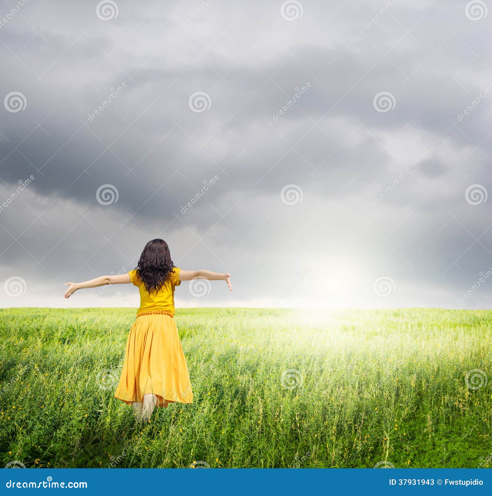 relax woman in green rice fields with rainclouds