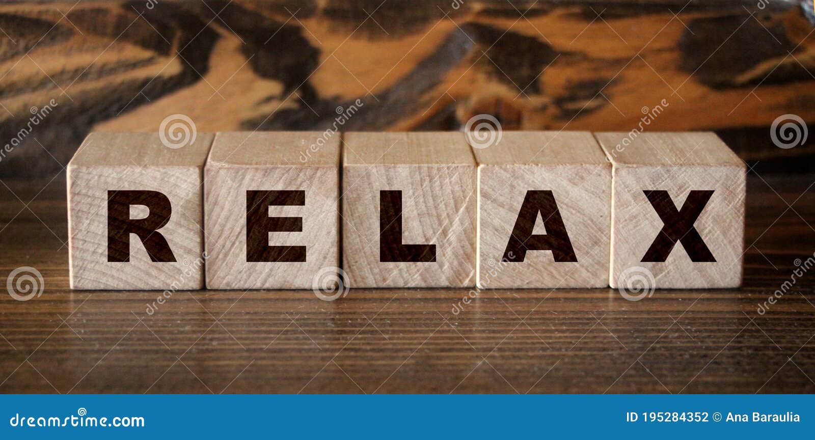 Relax Word Written in Wooden Cubes. Relaxation Healthcare Concept Stock ...