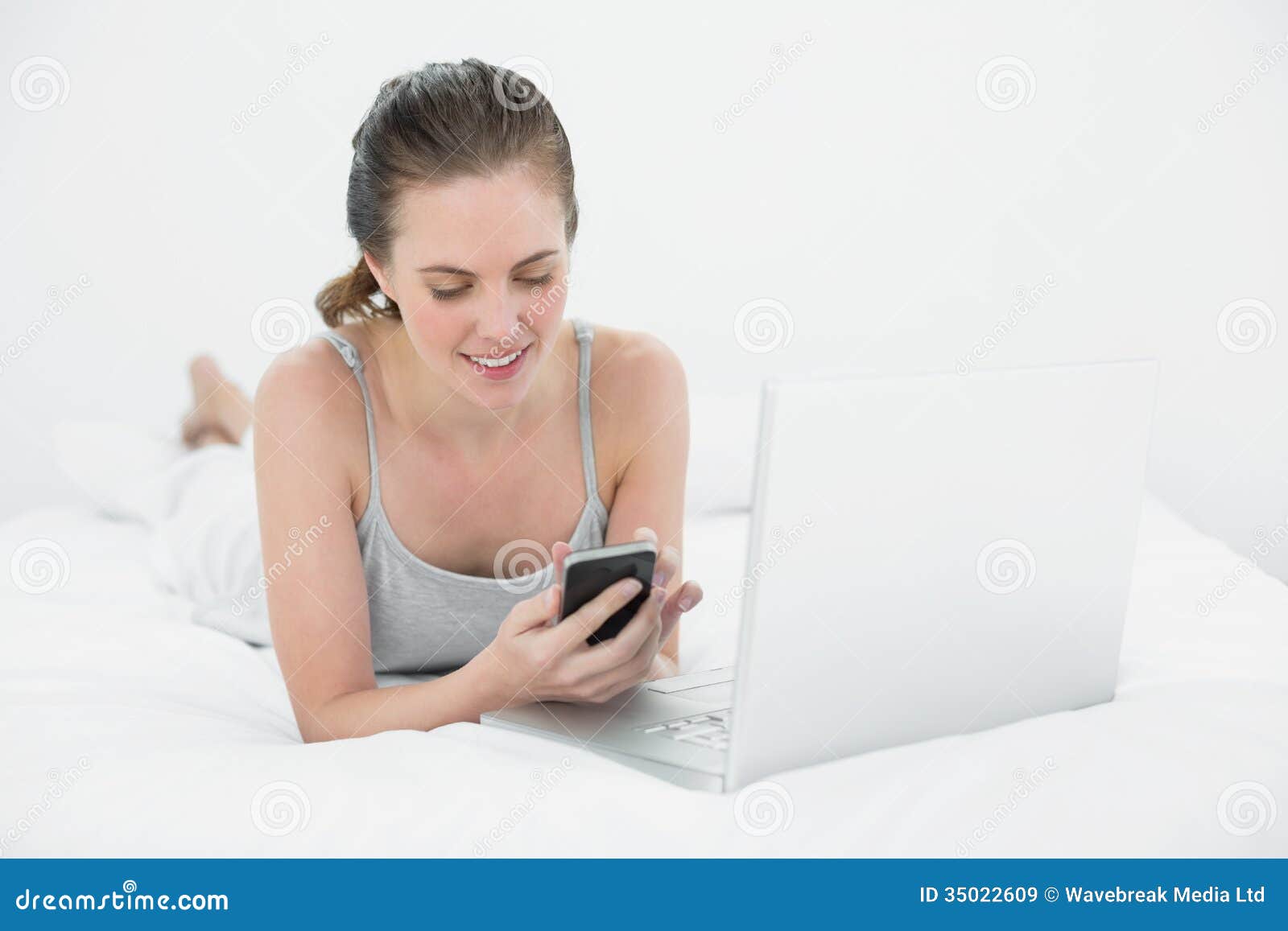 Relaxed Casual Woman Using Cellphone And Laptop Royalty Free Stock ...