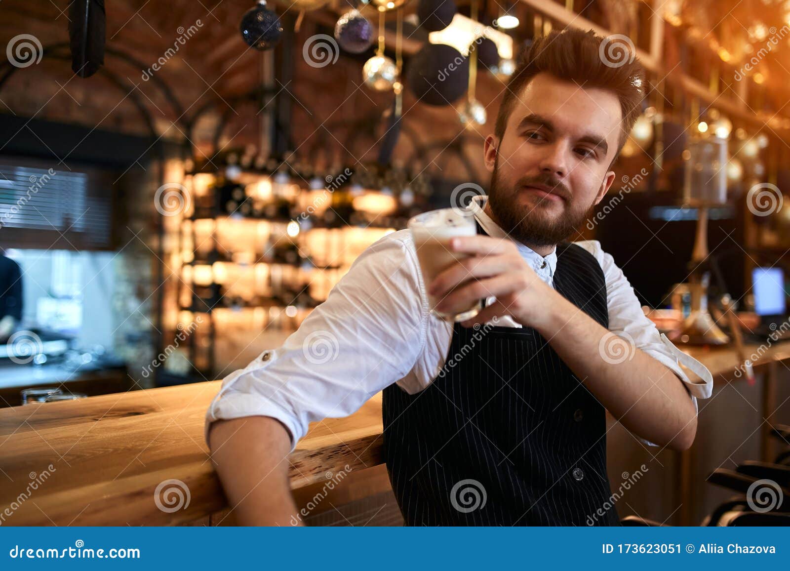 Relaxed Cheerful Bearded Waiter Having a Coffee Break at Workplace ...