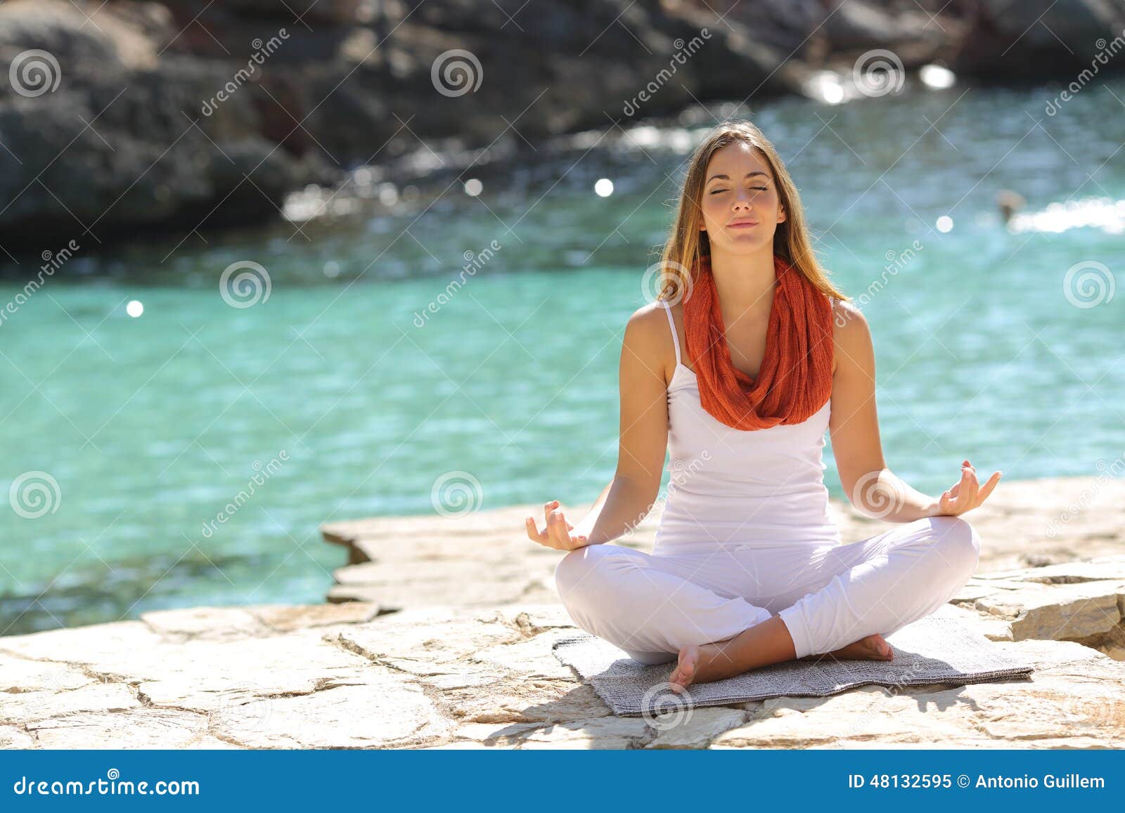 relaxed girl doing yoga exercises on holidays