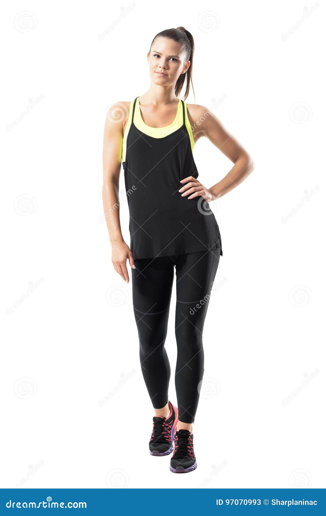 Relaxed Young Athletic Woman in Sports Clothing Walking Towards Camera ...