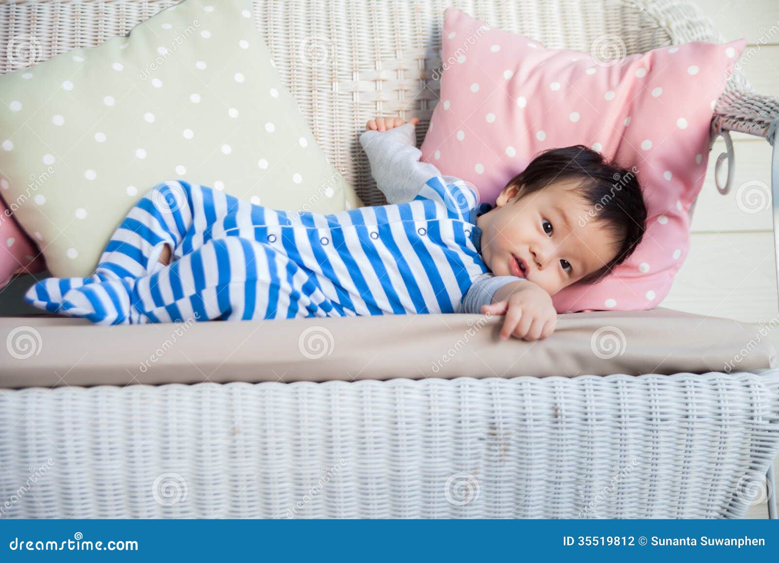 Relaxing baby boy on sofa stock photo. Image of pleasure 35519812