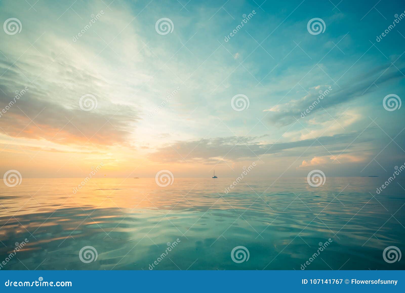 relaxing and calm sea view. open ocean water and sunset sky. tranquil nature background. infinity sea horizon