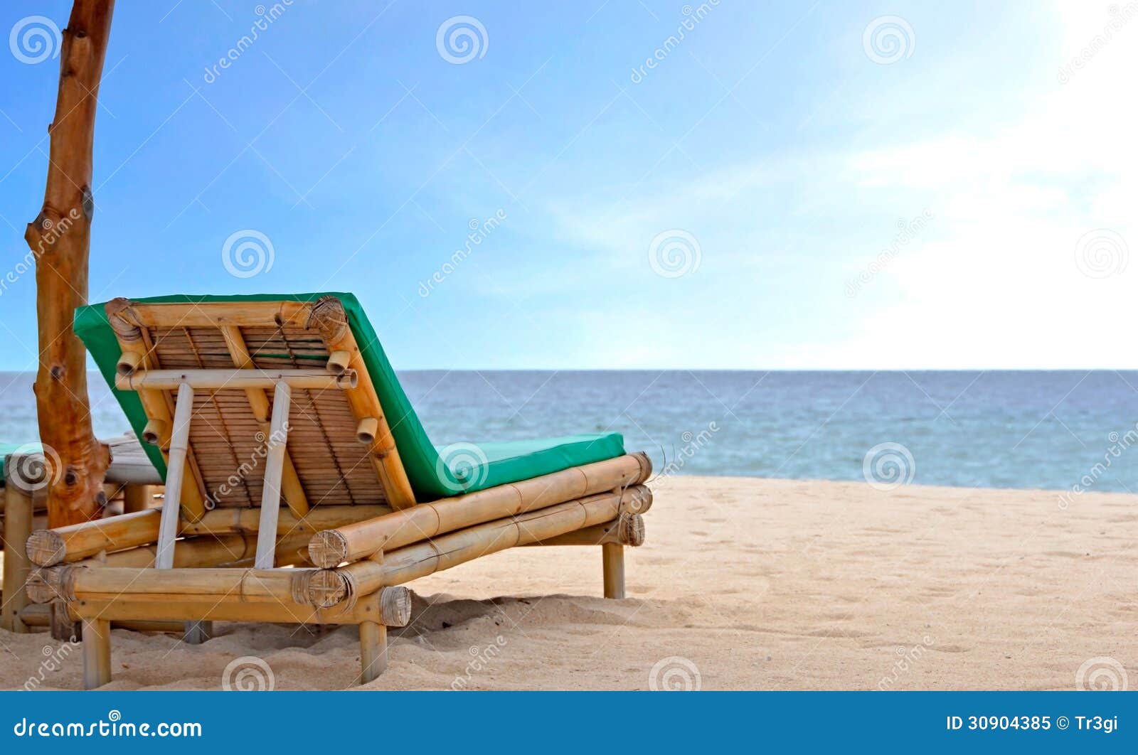 Relaxing Chair On White Sandy Beach Royalty Free Stock