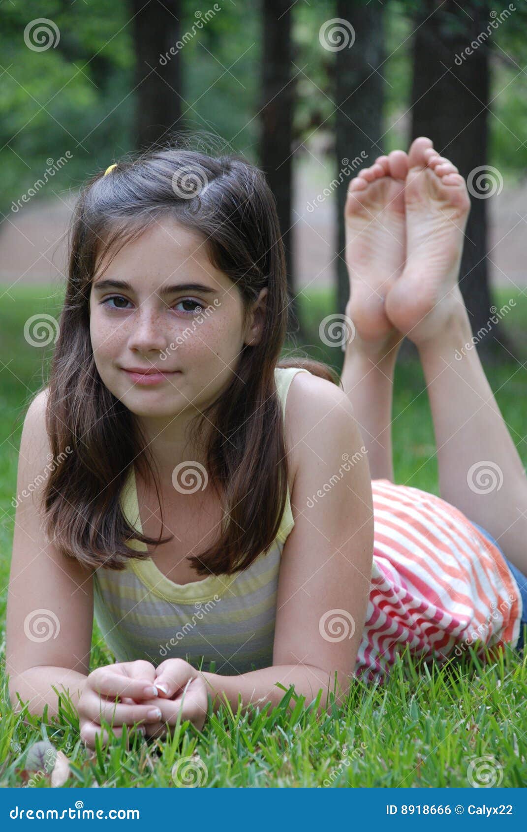 Tween Girl Relaxing On Couch At Home Royalty Free Stock Photo