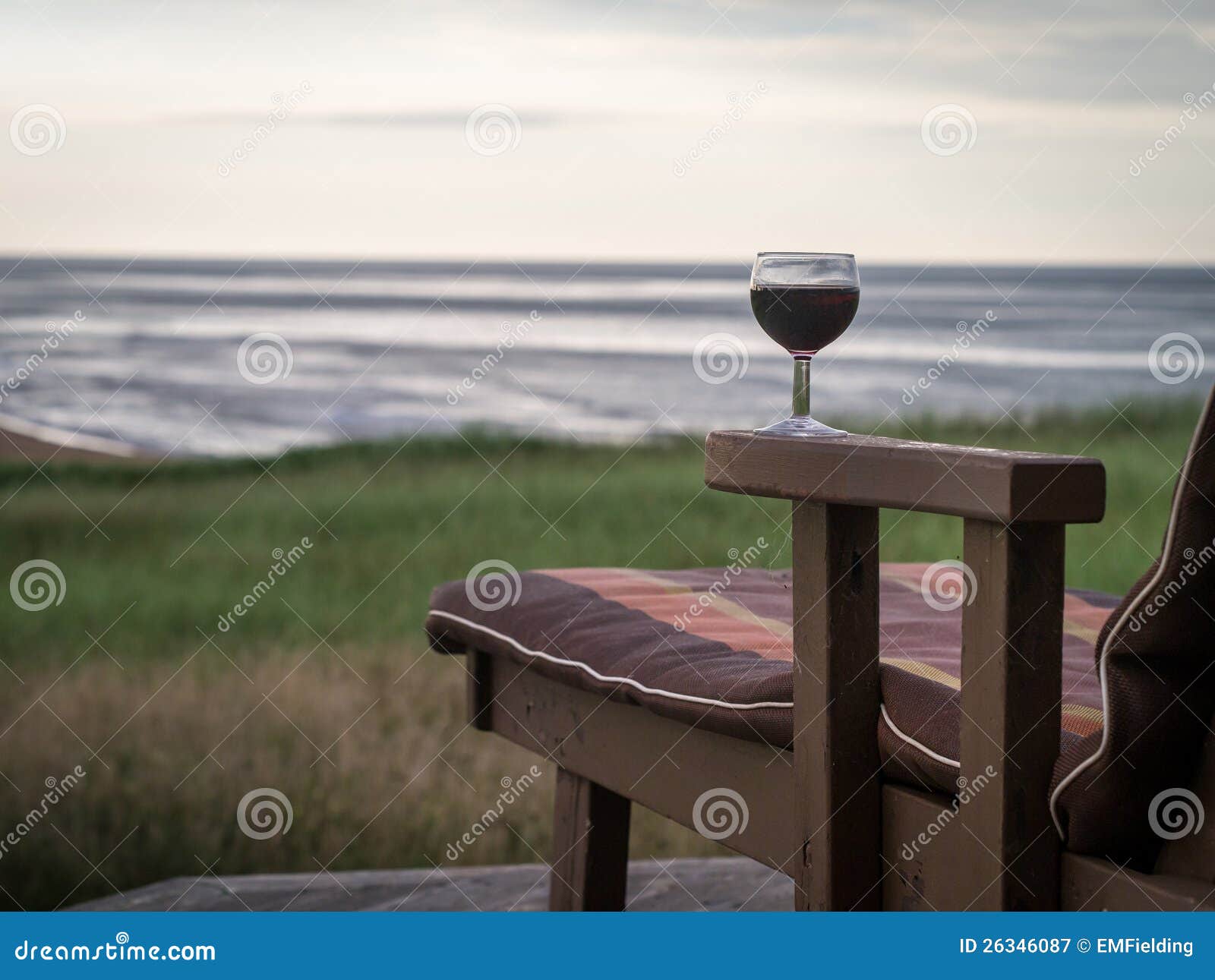 Relaxing at the Shore with a Glass of Wine Stock Image Image of serenity, peaceful 26346087