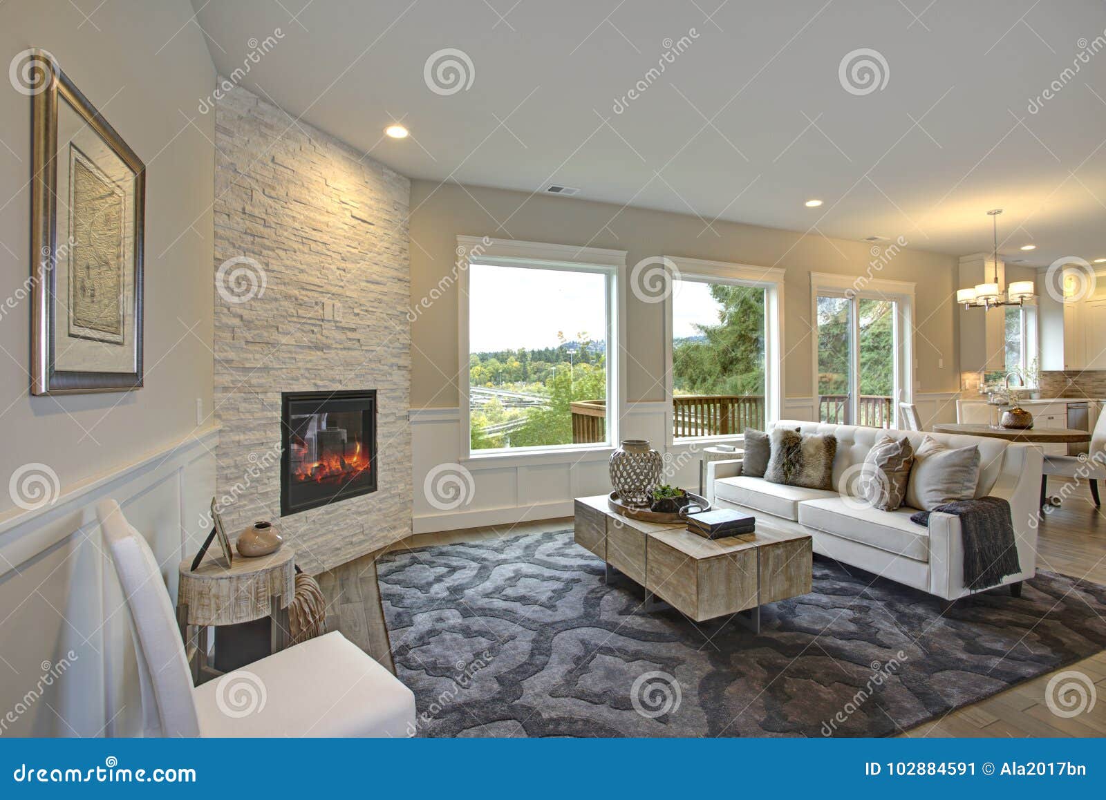 Luxury Living Room Features Corner Stone Fireplace Stock Image