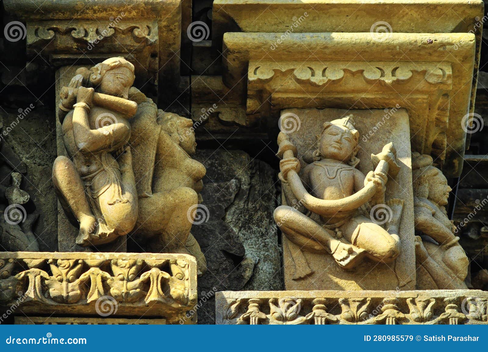 relief carving of gandharvas (divine dancers) on the wall of chaturbhuja temple at khajuraho