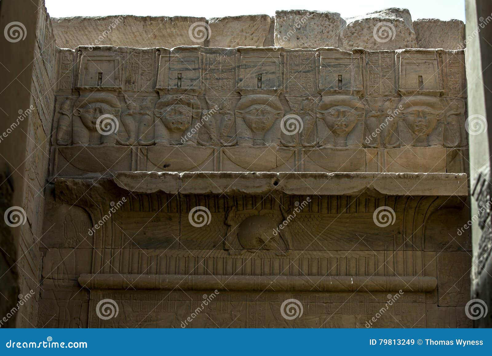 a relief depicting the god hathor at the temple of isis at philae in egypt.