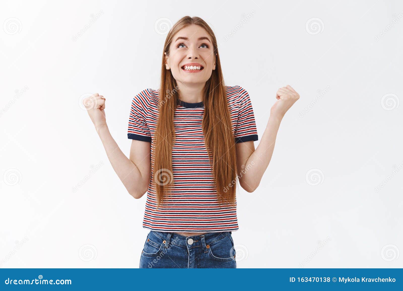 Relieved Happy Good Looking Woman In Striped T Shirt