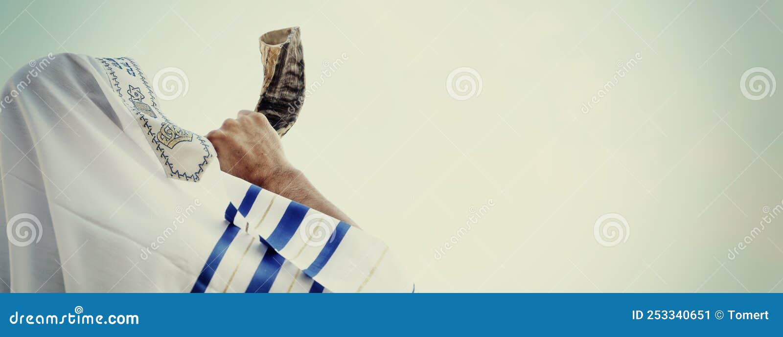 religion image of shofar & x28;horn& x29; on white prayer talit. rosh hashanah & x28;jewish new year holiday& x29;