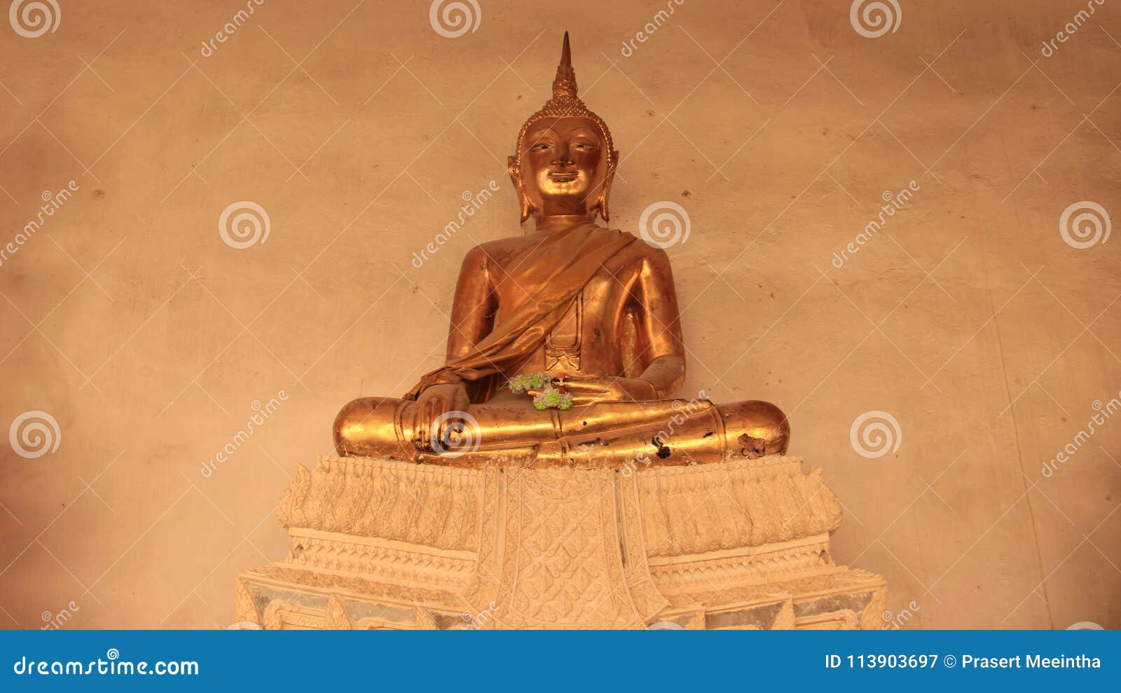 religion. smilingly golden buddhas image