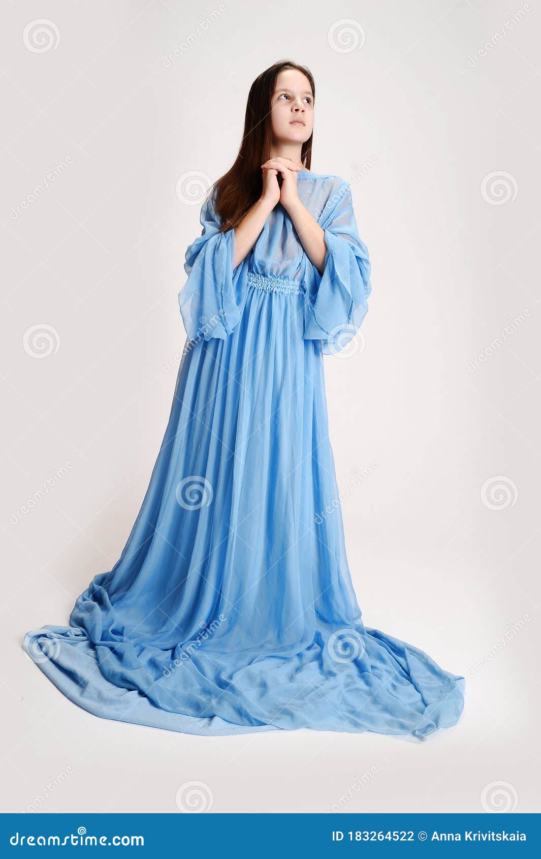 Religious Girl in a Blue Dress Stock Photo Image of cute, gospel
