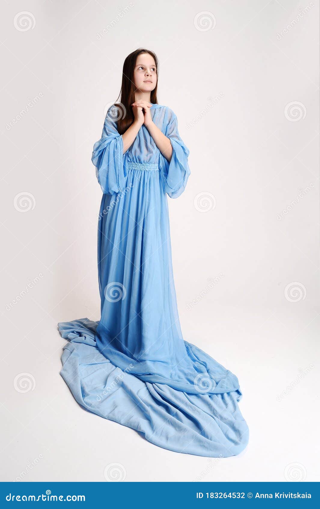 Religious Girl in a Blue Dress Stock Photo Image of hand, peace
