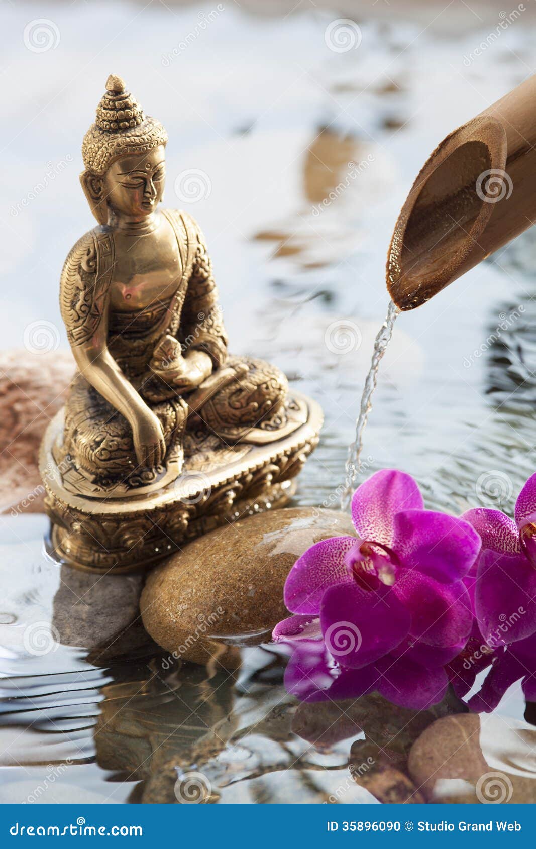 Religious Symbol with Dropping Water and Flowers Stock Photo - Image of ...