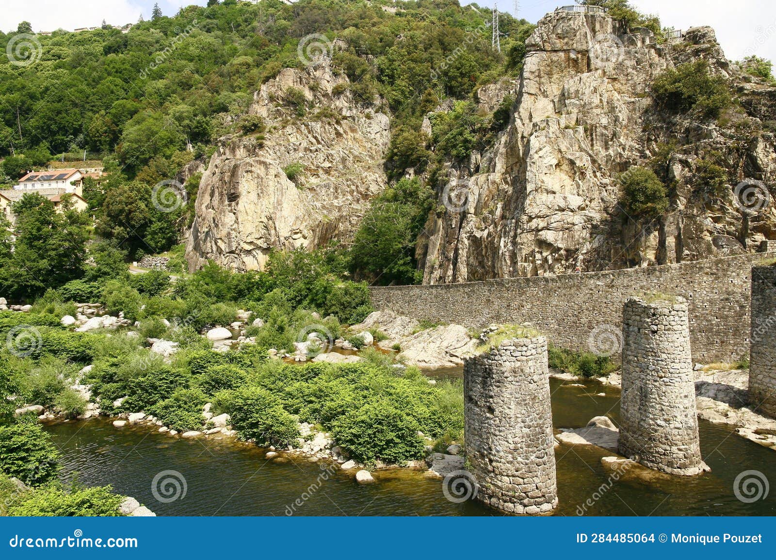 the ruins of a bridge over the river borne