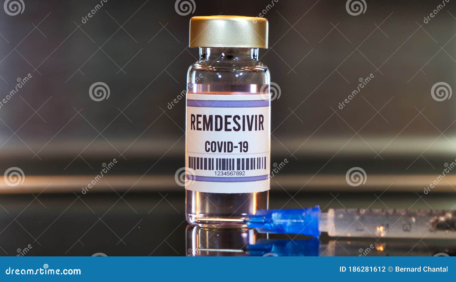 remdesivir drug and syringe on black table