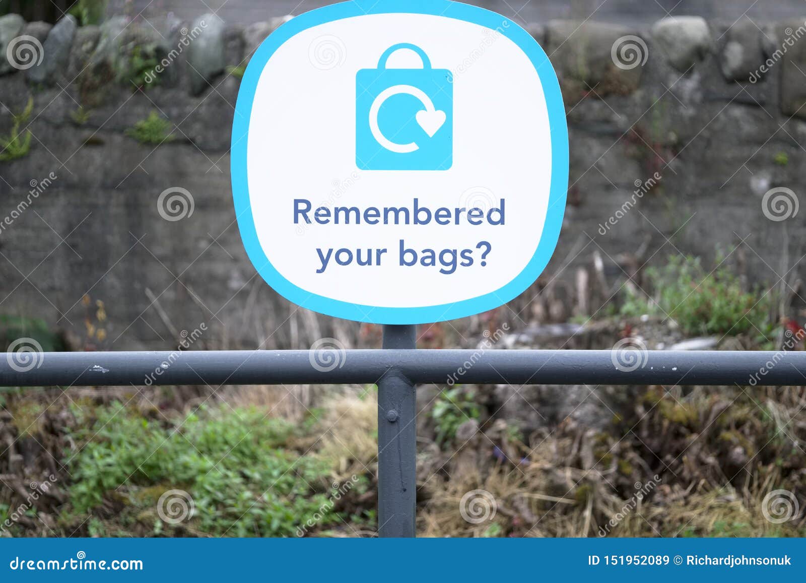 remembered your plastic bags sign at supermarket retail shop sign