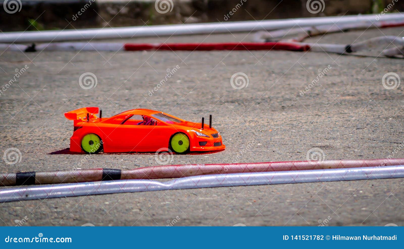 Remote Control Car Race Competition on Tarmac Circuit Stock Photo