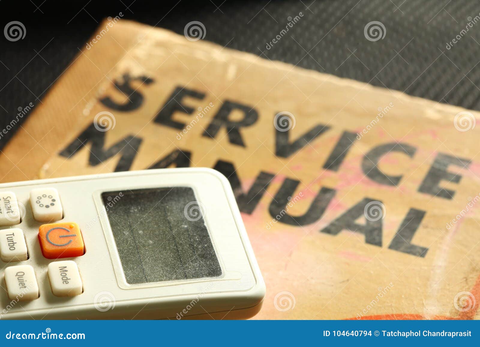 Remote Control and Old Service Book. Stock Photo Image of bulb, help