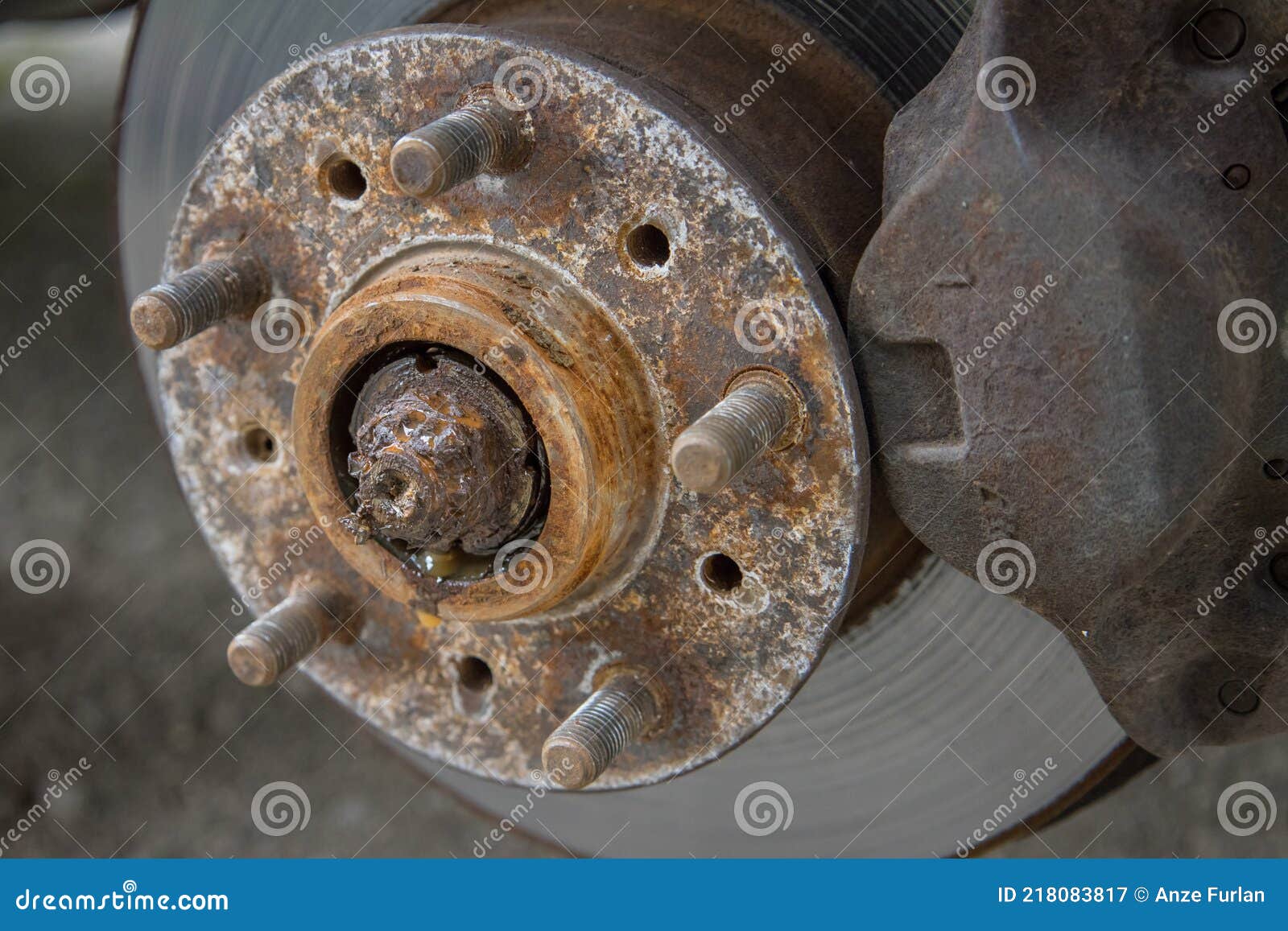 Removal of Front Wheel Bearing on a Passenger Car. Dirty Loud and Rusty ...