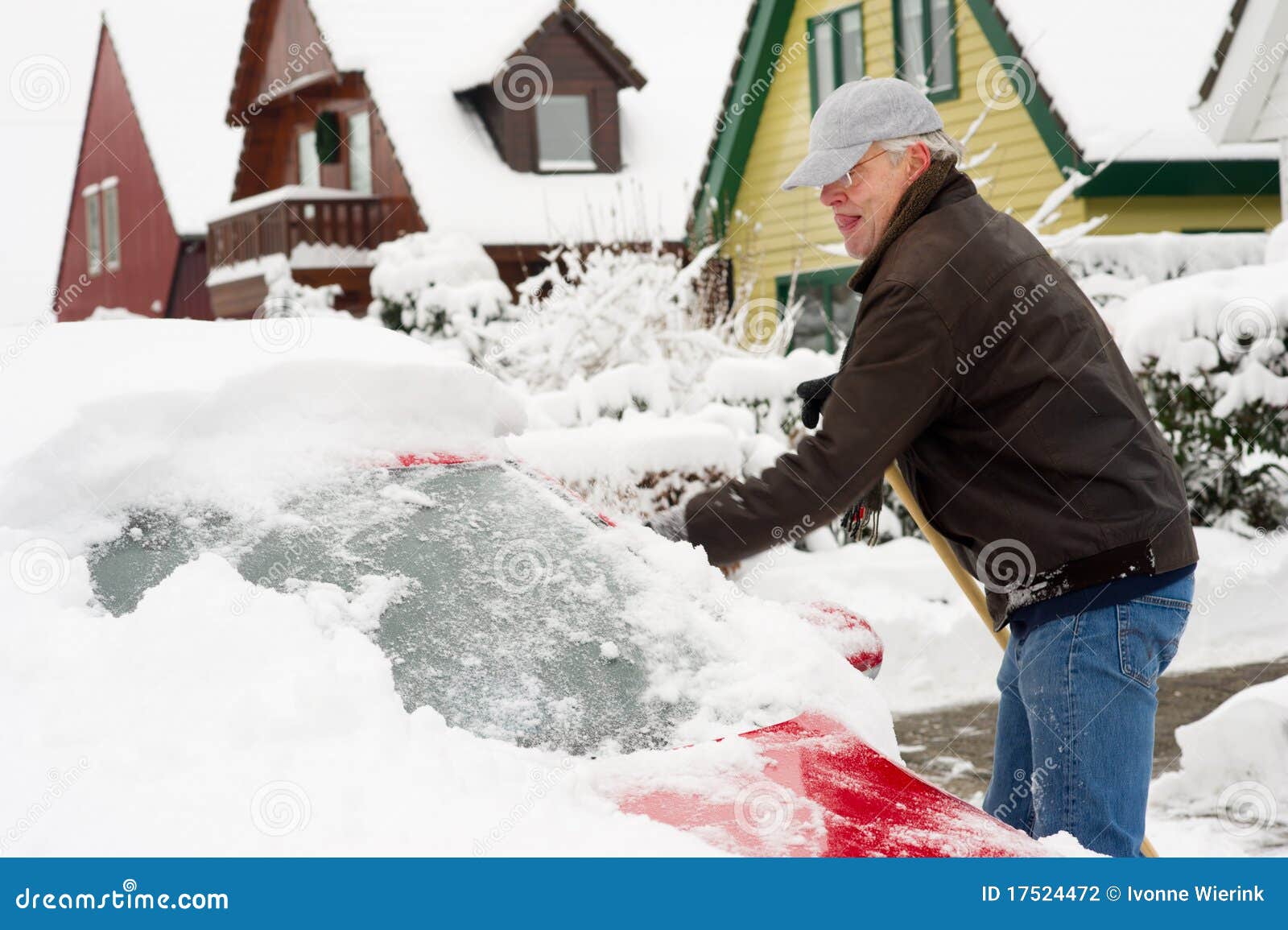 Removal snow from the car stock photo. Image of working 17524472